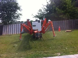 70-36AJ Climb in backyard through fence with outriggers out.webp