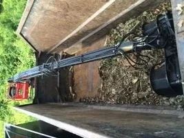 Grapple boom inside bed.webp