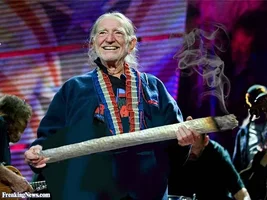 Willie-Nelson-Holding-a-Big-Joint--119157.webp