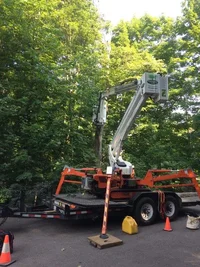 Easy Lift 70-36AJ working on top of trailer.webp