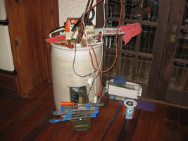 Chainsaw sharpening station on 55 gallon barrel.JPG